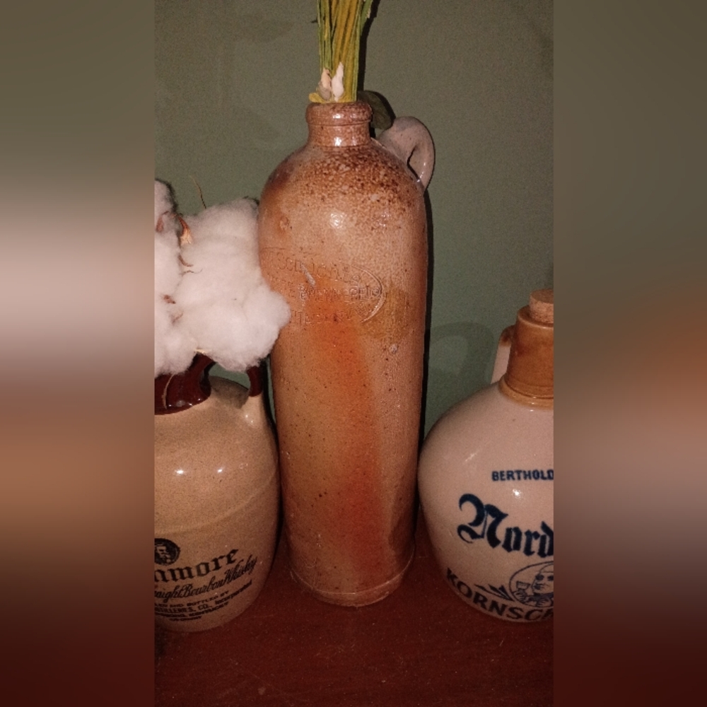 Vintage Ceramic Bottles with Embossed Details